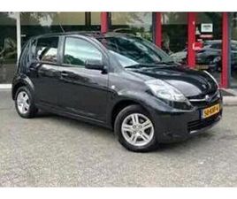 SUBARU JUSTY SUBARU JUSTY 1.0 2010 ZWART — SUBARU — MARKTPLAATS