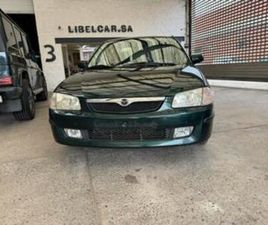 MAZDA 323 ② MAZDA 323 AUTOMATIC ESSENCE 1,5 TRES BELLE — MAZDA — 2EMEMAIN