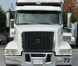 2015 VOLVO VHD TRI-AXEL DUMP TRUCK