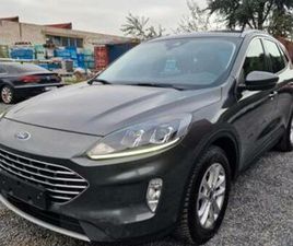② FORD KUGA 2.5 ECOBOOST FWD FHEV TITANIUM / HYBRID / TVA DED. — FORD — 2EMEMAIN