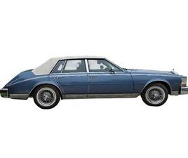 CADILLAC SEVILLE... EXCELLENT CONDITION... BUSTLE-BACK STYLING & MORE