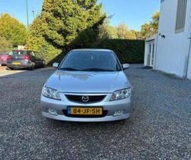 MAZDA 323 MAZDA 323 1.6 F COMFORT 2002 GRIJS AIRCO ! — MAZDA — MARKTPLAATS