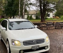 NISSAN STAGEA 250T RS FOUR