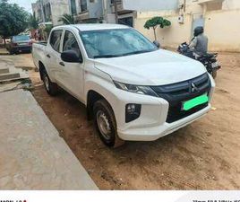 MITSUBISHI L200 PICK-UP 4X4 DOUBLE BLANCHE ET GRIS 2023 - KEUR MASSAR | EXPAT-DAKAR