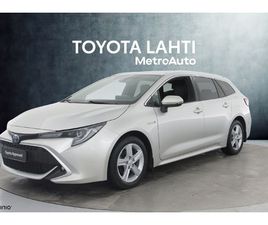 TOURING SPORTS 1,8 HYBRID STYLE