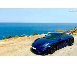 PORSCHE 718 CAYMAN GT4 PORSCHE CAYMAN 718 GT4 4.0 420 CH FRANÇAISE – GENTIANE BLEU MÉTAL-SUIVI COMPLET PORSCHE – 53.000 KM - PORSCHE APPROVED 10.2026 - PDLS+ - PASM - BOSE - HOMELINK