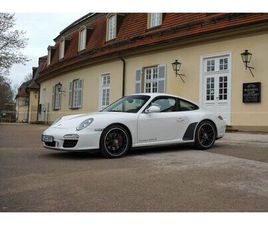 PORSCHE 997 CARRERA 4 GTS MIT LÜCKENLOSEM SCHECKHEFT