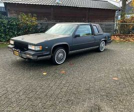 VOITURE CLASSIQUE CADILLAC DE VILLE COUPÉ 1987