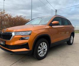 ② SKODA KAROQ 1.5TSI NAVI/LED/ZETELVERW/CRUISE C/DAB+/KEYLESS — SKODA — 2EMEMAIN