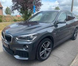 ② BMW X1 M PACK/AUTOMAAT/NAVI/CRUISE — BMW — 2EMEMAIN