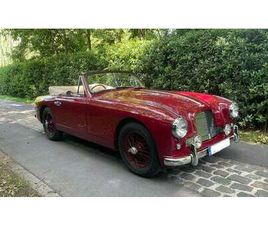 ASTON MARTIN DB2/4 1955 ASTON MARTIN DB2/4 ROUGE FONCÉ MANUEL CONDUITE À DRO...