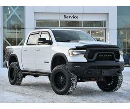 RAM 1500 2021 REBEL + LIFT KIT 6 POUCES + PNEUS 37 POUCES TOYO + TOIT PANO + FULL CUIR +