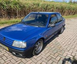 PEUGEOT 309 GTI ② PEUGEOT 309 GTI 1.9 16V MIAMI BLUE 160 CV AVEC NAP MI16 — PEUGEOT — 2EMEMAIN