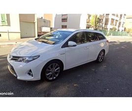 TOYOTA AURIS TOURING SPORTS VEND OU ÉCHANGE TOYOTA AURIS II TOURING SPORTS HYBRIDE 136H DYNAMIC