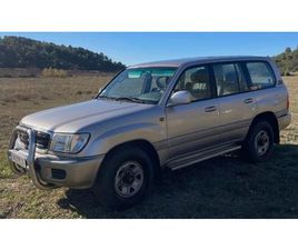 TOYOTA SÉRIE 100 1999 TOYOTA 100 SERIES GRIS MANUEL, 5 VITESSES CONDUITE À...