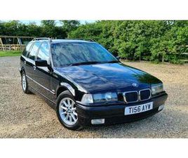 1999 BMW 3 SERIES NOIR AUTOMATIQUE, 6 VITESSES CONDUITE À...