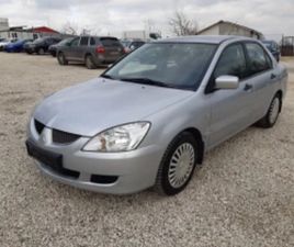 MITSUBISHI LANCER MITSUBISHI LANCER 1.6 I AVTOMAT ≫ 2006 • 6 700 ЛВ. • ID