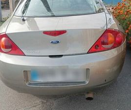 ÉCHANGE FORD COUGAR V6