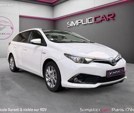 TOYOTA AURIS TOURING SPORTS TOYOTA AURIS TOURING SPORTS MY17 HYBRIDE 136H DESIGN/ENTRETIEN A JOUR/GARANTIE 12 MOIS