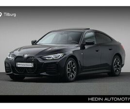 EDRIVE40 HIGH EXECUTIVE 84 KWH | MODEL M SPORT | GLAZEN SCHUIF-/KANTELDAK | HIFI SYSTEM HARMAN KARDON | ACHTERUITRIJCAMERA | ELEKTRISCH VERWARMDE VOORSTOELEN