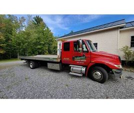 INTERNATIONAL TRUCKS DURASTAR 2006 INTERNATIONAL 4300 ROLLBACK FLATBED