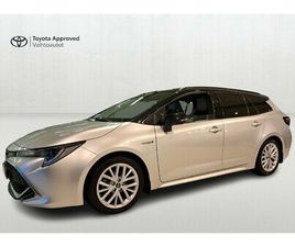 TOURING SPORTS 1,8 HYBRID STYLE