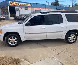 2006 GMC ENVOY XL 3 ROWS 4X4 VERY CLEAN NO RUST