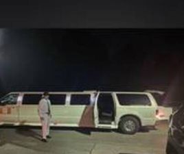 LIMOUSINE 30 FT STRETCH FORD SUV EXCURSION W/ BUSINESS