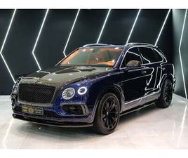 BENTLEY BENTAYGA W12, CARBON FIBER BODY KIT, PANORAMIC ROOF, STARLIGHT HEADLINER, GCC SPECS!!
