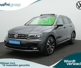 VOLKSWAGEN TIGUAN VOLKSWAGEN TIGUAN 2.0 TDI 150 PK DSG R-LINE | PANORAMADAK | TREKHAAK | NAVIGATIE DISCOVER PRO | STUUR-/ACHTERBANKVERWARMING | ACHTERUITRIJCAMERA
