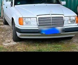 WEIßER MERCEDES BENZ 230 E - W124 - OLTIMER