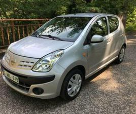 ② 1.0I 5 DEURS GEKEURD+CARPASS — NISSAN — 2EMEMAIN