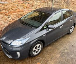 A SAISIR PRIUS 1.8L VVT-I 136CH. HYBRID RECHARGEABLE DYNAMIC(BOÎTE AUTOMATIQUE)(CAMÉRA DE RECUL)(VIGNETTE CRIT'AIR1) SUIVI TOYOTA