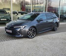 ② TOYOTA COROLLA TS 1.8 HYBRID PREMIUM 140PK FACELIFT +TREKHAA — TOYOTA — 2EMEMAIN