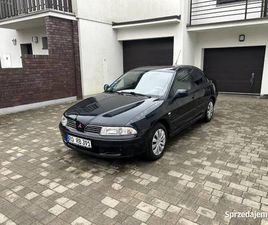 MITSUBISHI CARISMA MITSUBISHI CARISMA 1.8I ' ELEGANCE ' AUTOMAT ' KLIMATYZACJA OSTRZESZÓW - SPRZEDAJEMY.PL