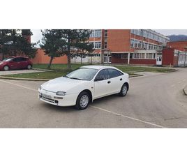 MAZDA 323 O C U V A N A