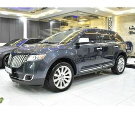 LINCOLN MKX AWD ( 2013 MODEL ) IN GREY COLOR GCC SPECS THIS HAS DONE A KILOMETER OF 210,000 KM