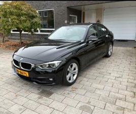 BMW 3-SERIE 318I 136PK AUT 2017 ZWART — BMW — MARKTPLAATS