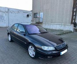 ② OPEL OMEGA BERLINE YOUNGTIMER 2.2 DTI GEKEURD MET CARPASS — OPEL — 2EMEMAIN