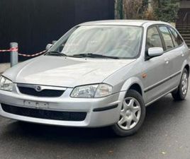 ② MAZDA 323 F 1.4 BENZINE — MAZDA — 2EMEMAIN