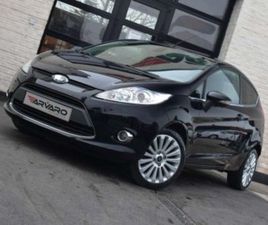 1.25I TITANIUM XENON AIRCO GARANTIE