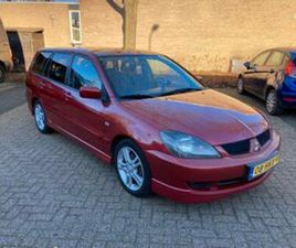 MITSUBISHI LANCER WAGON 2009 ROOD | TREKHAAK | EXTRA WIELSET — MITSUBISHI — MARKTPLAATS