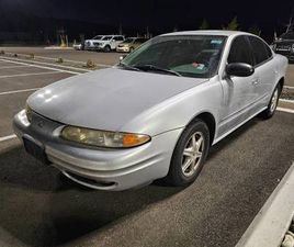 2004 OLDSMOBILE ALERO 4-DOOR SEDAN, V6-AUTO, FRONT WHEEL DRIVE.