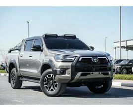 TOYOTA HILUX THE TOYOTA HILUX IS A LEGENDARY, DURABLE PICKUP TRUCK KNOWN FOR ITS LEGENDARY TOUGHNESS, OFF-ROAD CA