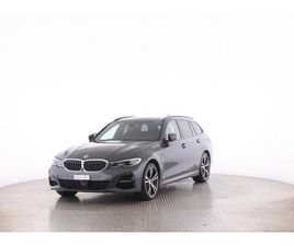 330E XDRIVE TOURING