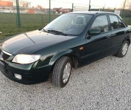 MAZDA 323 ② MAZDA 323. 1,3I.ESSENCE.2003.150KM. PRÊT À ÊTRE IMMATRICULÉ. — MAZDA — 2EMEMAIN