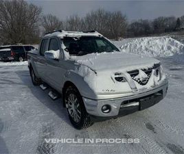 NISSAN FRONTIER USED 2009 NISSAN FRONTIER LE CREW CAB