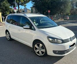 VOLKSWAGEN TOURAN 7 PLACES. 2.0L TDI 140CH. TOUTES OPTIONS. ÉDITION CARAT