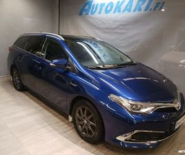 TOURING SPORTS 1,8 HYBRID PREMIUM