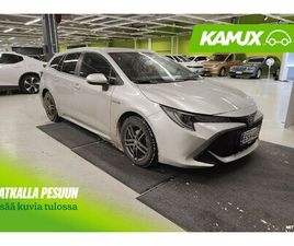 TOURING SPORTS 1,8 HYBRID STYLE